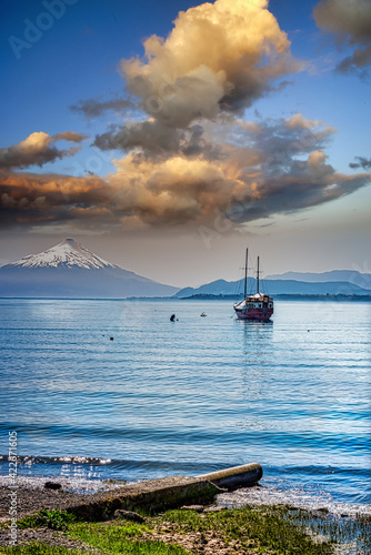  Boat on Lake Osorno, Puerto Varas, Chile with Osorno Volcano across Lake Llanquihue  photo