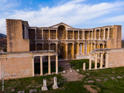 General aerial view of ruins of antique bath gymnasium complex at archaeological site of Sardis, Salihli, Manisa, Turkey © JackF