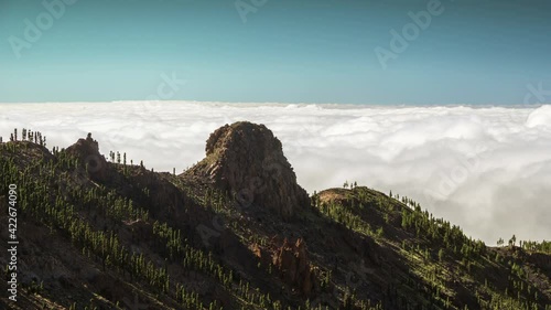 Timelapse of a clouds moving fast in the mountains volcano Teide on Tenerife, Canary Islands Spain 4K
 photo