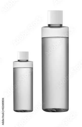 Plastic toner bottles on white background