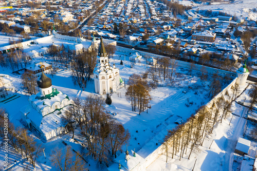 Scenic aerial view on winter day of Orthodox Holy Dormition Convent located on territory of Alexandrovskaya Sloboda in city of Alexandrov, Vladimir Region, Russia © JackF