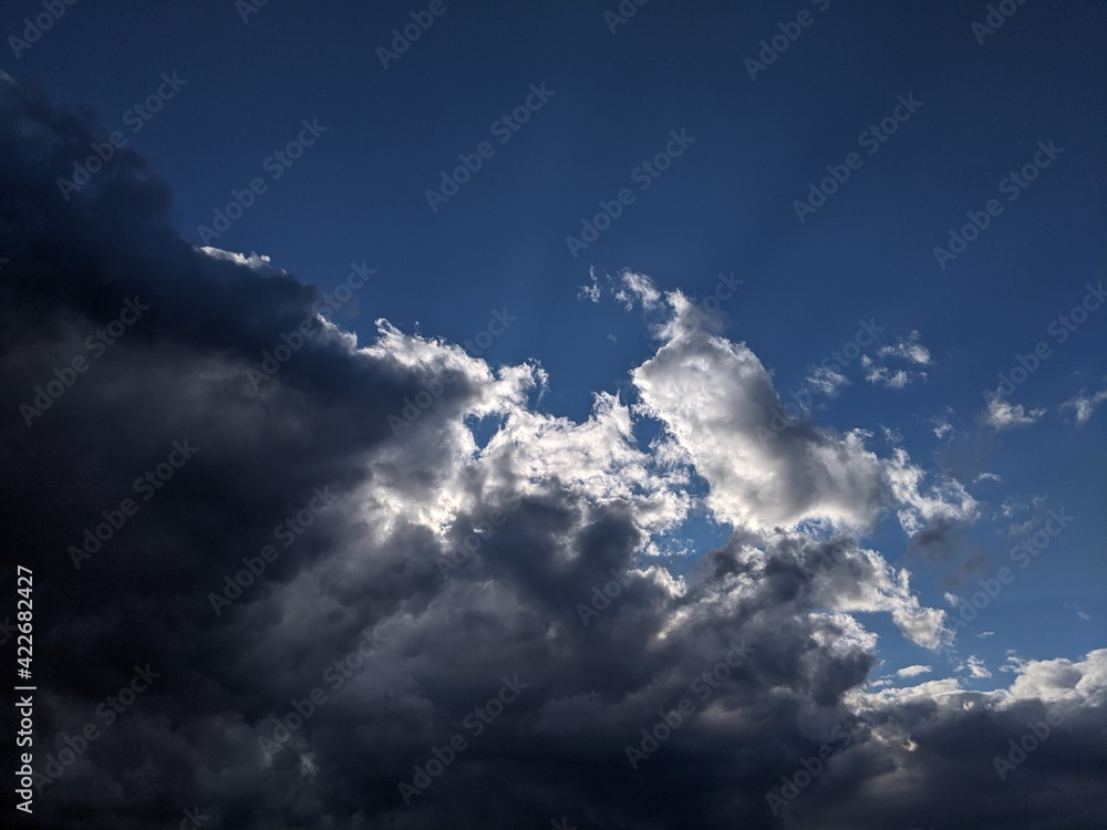 Obraz premium Dramatic blue sky with dark clouds in the summer in Brisbane, Queensland, Australia