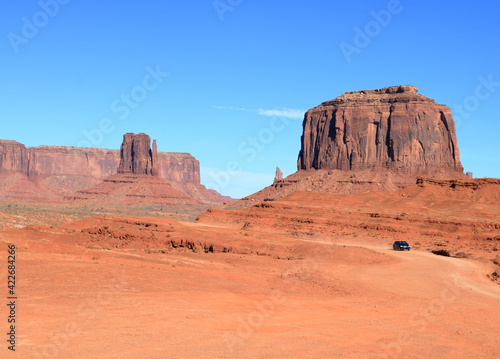 Monument Valley landscape in Arizona with the scenic drive seen in the distance