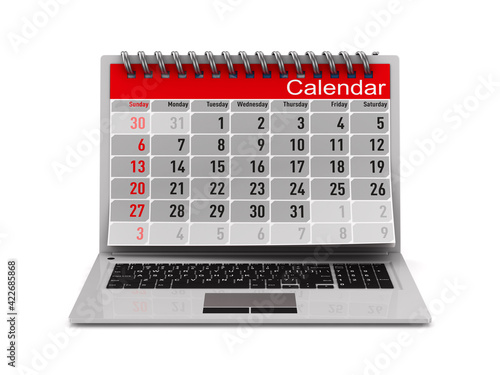 laptop and calendar on whit...