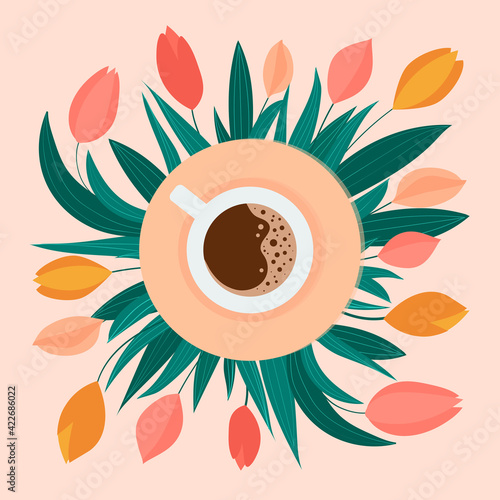 A cup of coffee with froth and tulips around it. Spring concept.