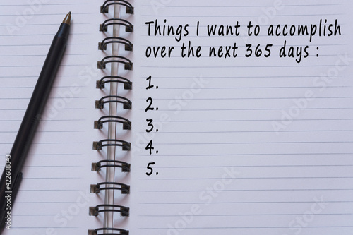 Text on notepad - Things I want to accomplish over the next 365 days