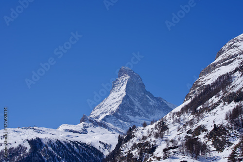 Peak of Matterhorn mountain seen from village Zermatt, Switzerland. © Michael Derrer Fuchs