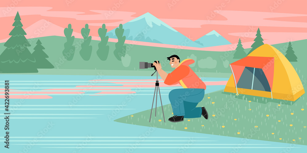 A young photographer sets up a camera on the shore of a beautiful mountain lake. Travel and hobby concept A young photographer sets up a camera on the shore of a beautiful mountain lake. Travel and hobby concept