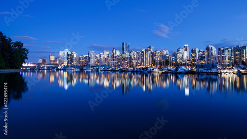 High Rise Buildings form the Downtown and Coal Harbour skyline, viewed from the Vancouver Harbor © khalid