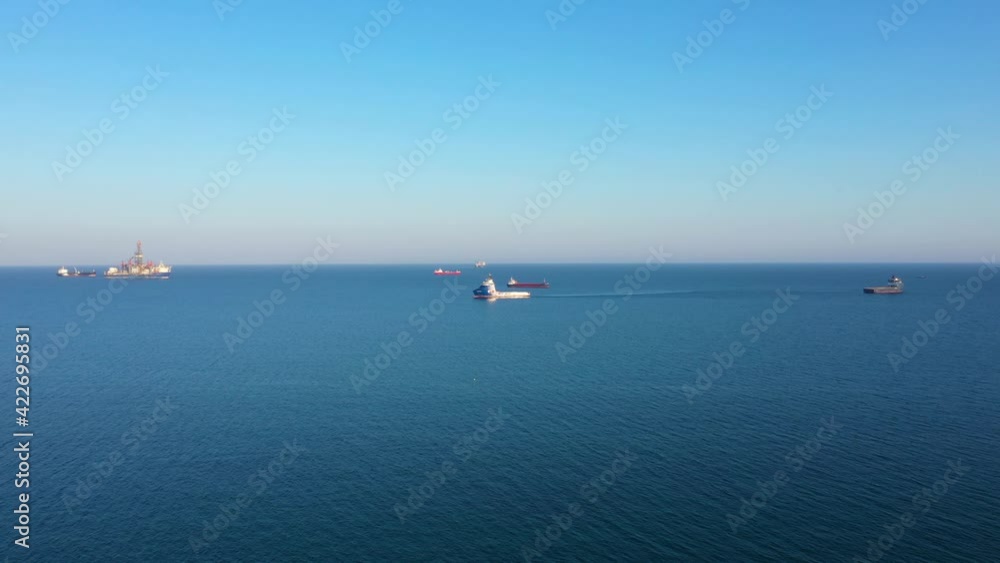 Vessel with landing ground on deck and navigation antennas Vessel with landing ground on deck and navigation antennas