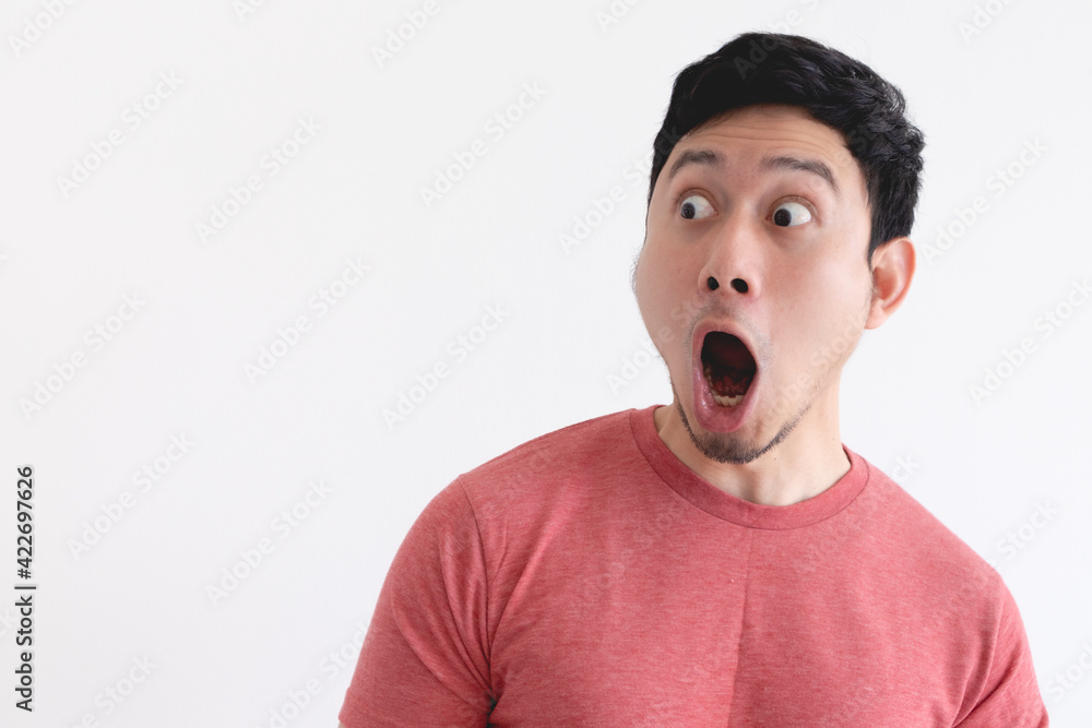 Wow and shocked face of funny Asian man isolated on white background. Wow and shocked face of funny Asian man isolated on white background.