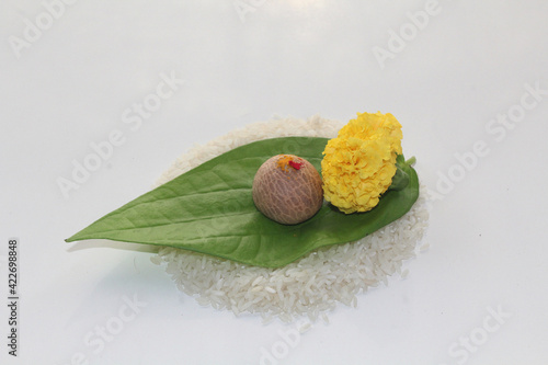 Betel Leaf, Areca nut, Rice, Kumkum & Turmeric, for puja or wedding ceremony. India photo