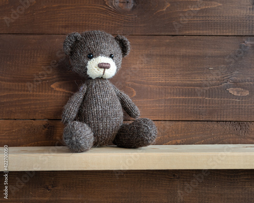 Knitted brown bear.
