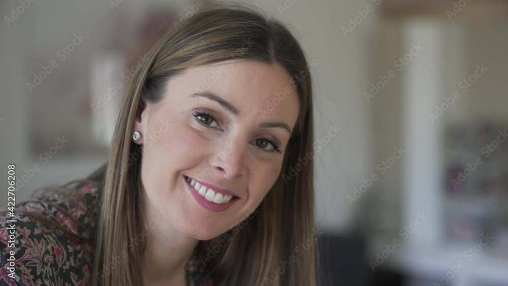 Portrait of beautiful and smiling woman relaxing at home Portrait of beautiful and smiling woman relaxing at home