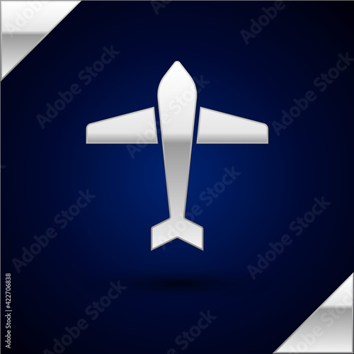 Silver Jet fighter icon isolated on dark blue background. Military aircraft. Vector