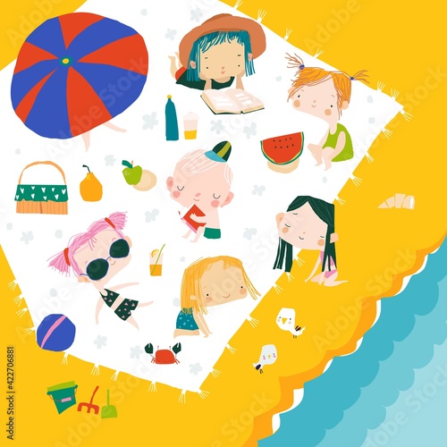 Happy children having picnic at sea coast. Hello summer