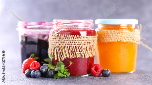 assorted of jam and berry fruit