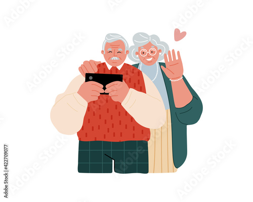 A couple of elderly people with a cell phone. Senior people using smart devices.