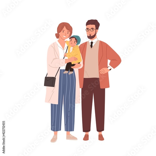 Family portrait of happy mother, father and baby. Parents standing together a...