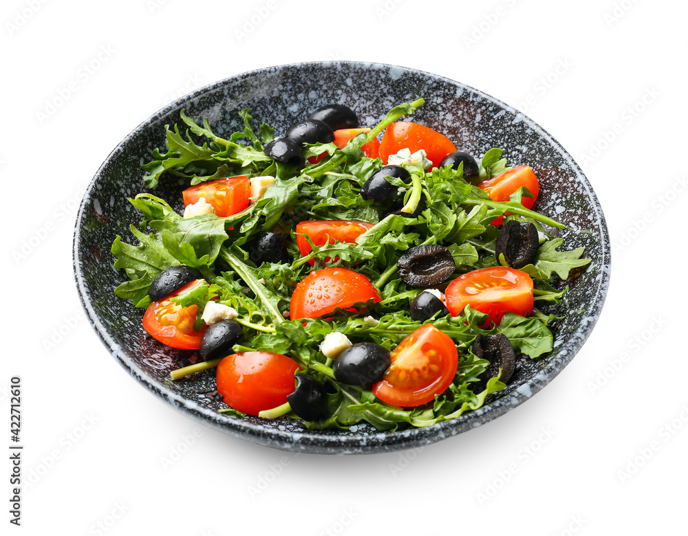 Plate with arugula salad on white background