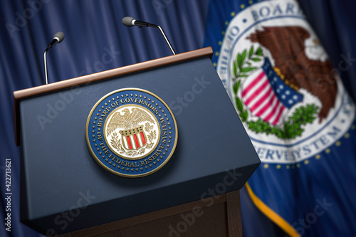 Federal Reserve System Fed of USA chairman press conference concept. Tribune with symbol and flag of Fedreal Reserve.