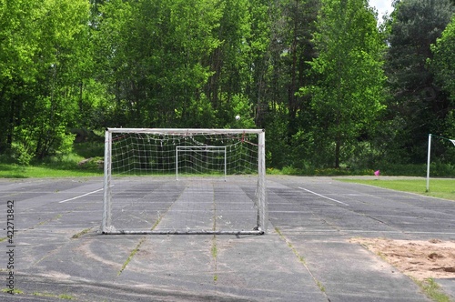 Wallpaper Mural Old outdoor soccer field with a goalpost in a green park Torontodigital.ca
