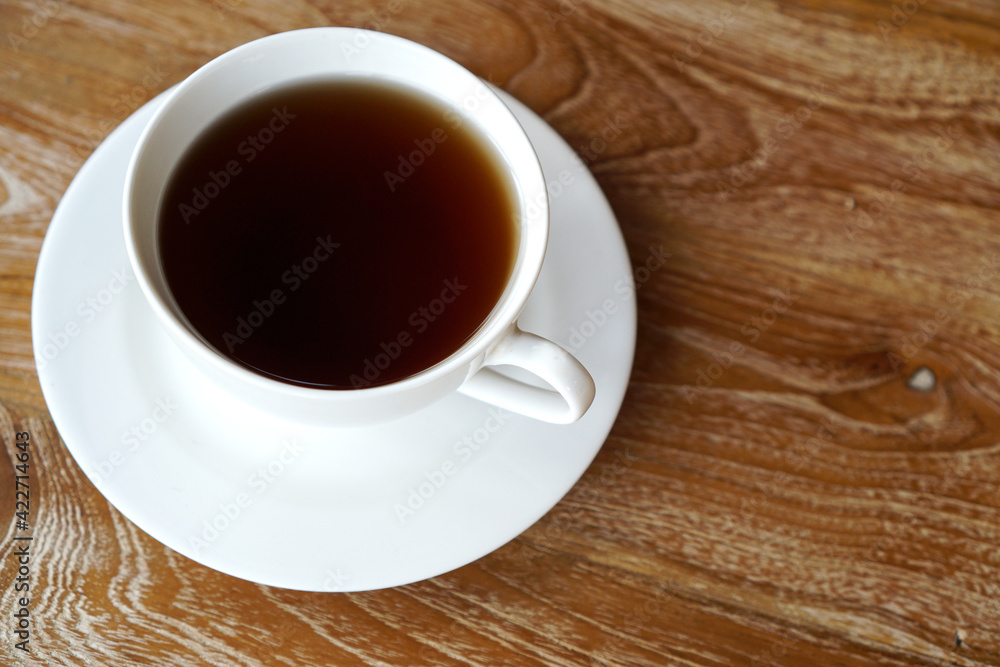 A glass of warm tea on the table