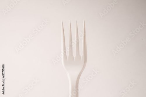 Disposable forks on a white background. Isolated