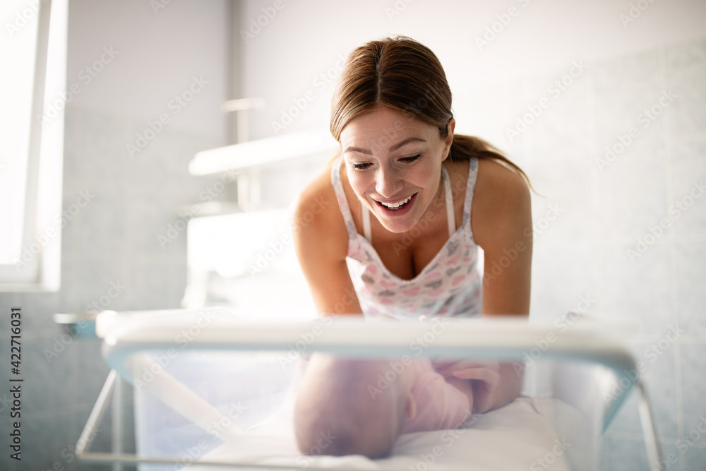 Portrait of beautiful young happy mother with baby Portrait of beautiful young happy mother with baby