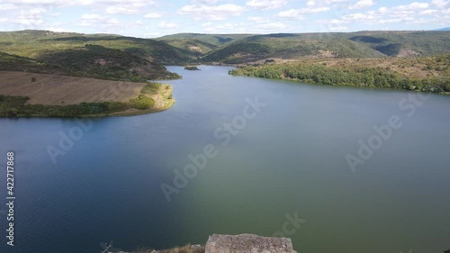 Aerial view of church of Saint John the Baptist and Pchelina Reservoir, Pernik Region, Bulgaria photo