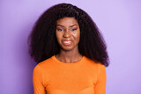 Photo of shiny moody dark skin woman dressed orange shirt not like bad smell isolated purple color background