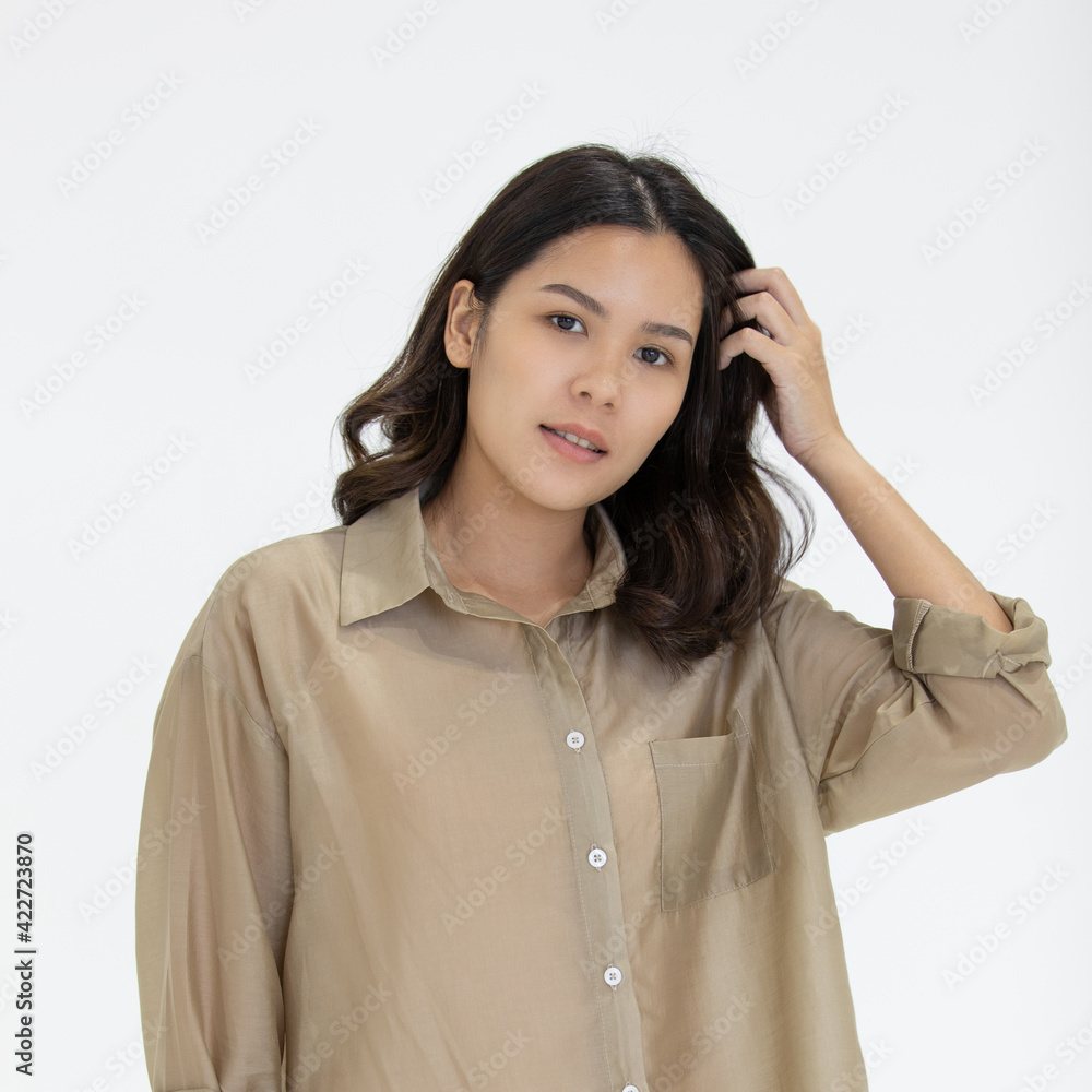 Portrait of hipster Asian beautiful woman in casual dress posing with self-confidence on white background Portrait of hipster Asian beautiful woman in casual dress posing with self-confidence on white background