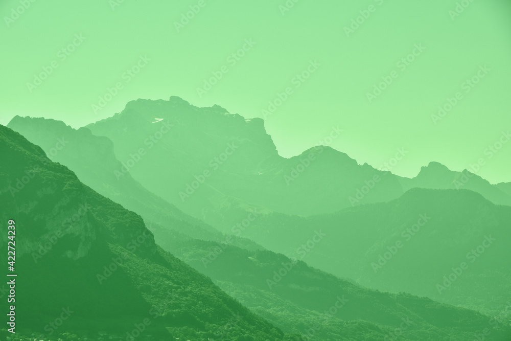 Green toned aerial perspective mountain landscape