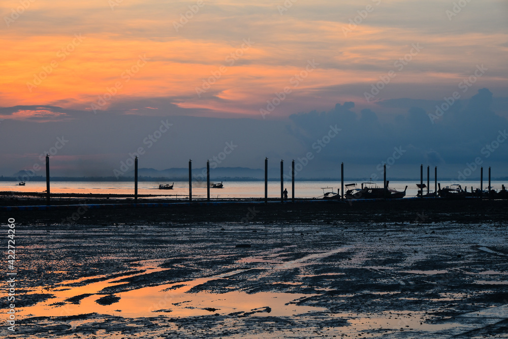 Beautiful sunrise over sea pier in Thailand