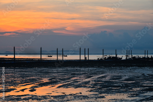 Beautiful sunrise over sea pier in Thailand