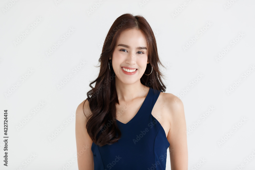 Portrait of a young teen Asian woman with black long hair on white background Portrait of a young teen Asian woman with black long hair on white background