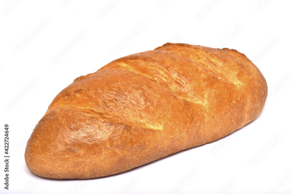 Loaf of white bread on a white plate.. Loaf of white bread on a white plate..