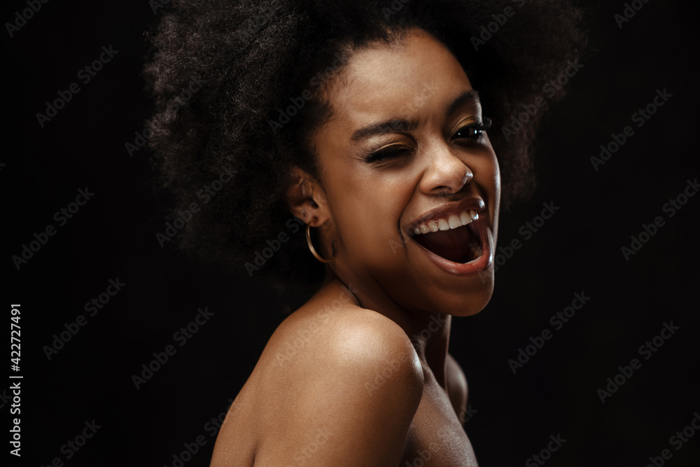 Happy young african woman in dress standing Happy young african woman in dress standing