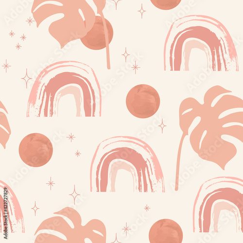 Abstract modern wall art with rainbow, monstera leaf, sun, stars.