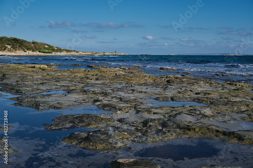 IBIZA, SPAIN, Ses Salines, view from rocky beach to old beach bar