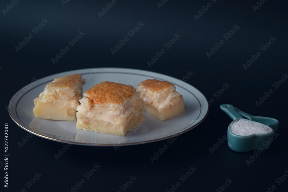  Selective focus. Homemade fresh baked magic cake; a French recipe called 