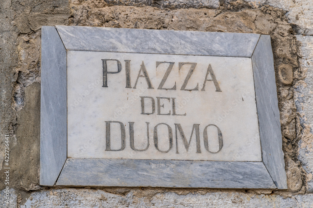 Piazza del Duomo square name sign in the center of Cefalù, Sicily, Italy Piazza del Duomo square name sign in the center of Cefalù, Sicily, Italy