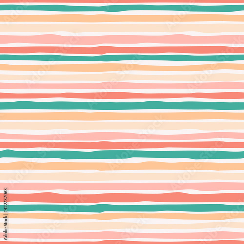 Seamless repeating pattern with hand drawn multicolored wavy stripes with ragged edges