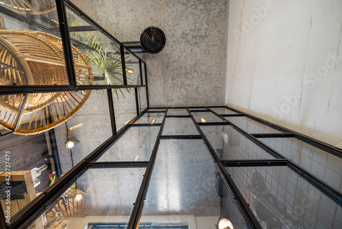Vászonkép Glass partition to the home office in loft style