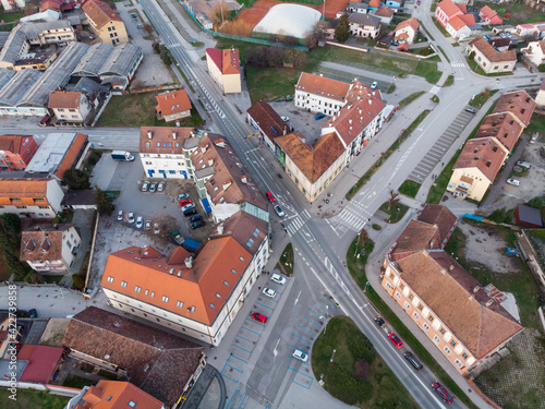 City Koprivnica, Croatia. Panoramic drone photos of the city center taken during the sunset in the winter. View on the city street, park and church.