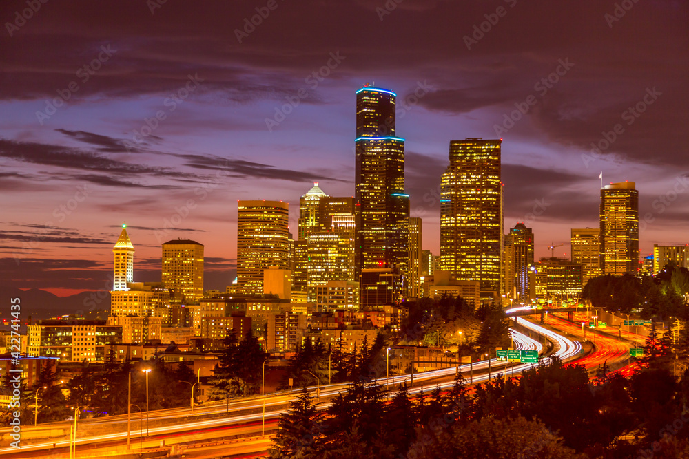 View of Seattle downtown over I5 interstate highway at sunset from Dr. Jose Rizal Park, Washington, USA View of Seattle downtown over I5 interstate highway at sunset from Dr. Jose Rizal Park, Washington, USA