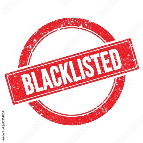Fotografía BLACKLISTED text on red grungy round stamp.