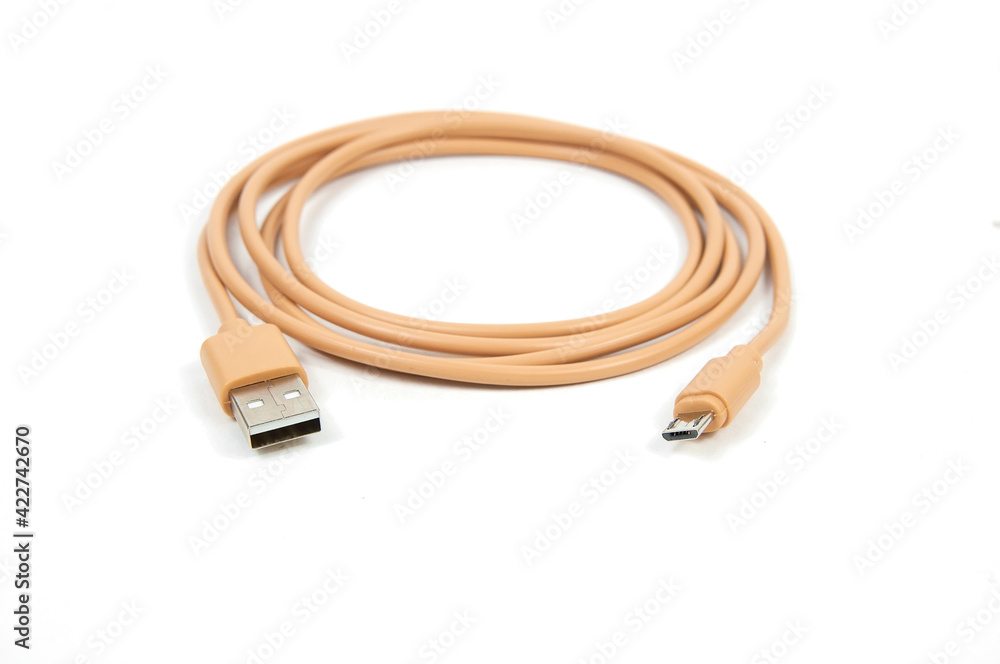 brown cable with usb and micro usb connector rolled in a circle on a white background isolated brown cable with usb and micro usb connector rolled in a circle on a white background isolated