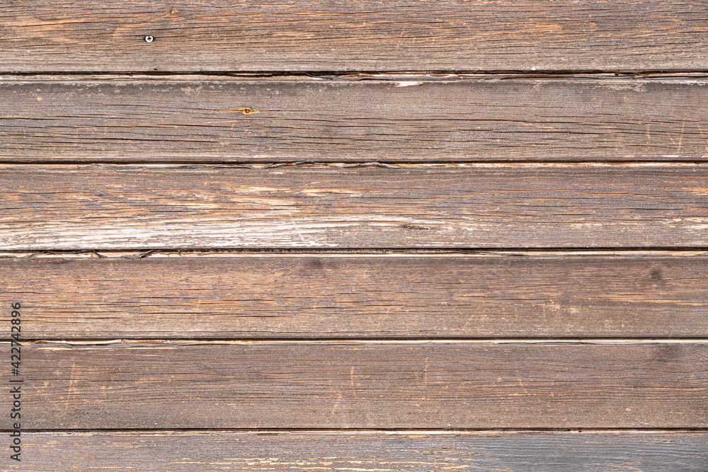 Wooden gray fence in the form of an abstract background