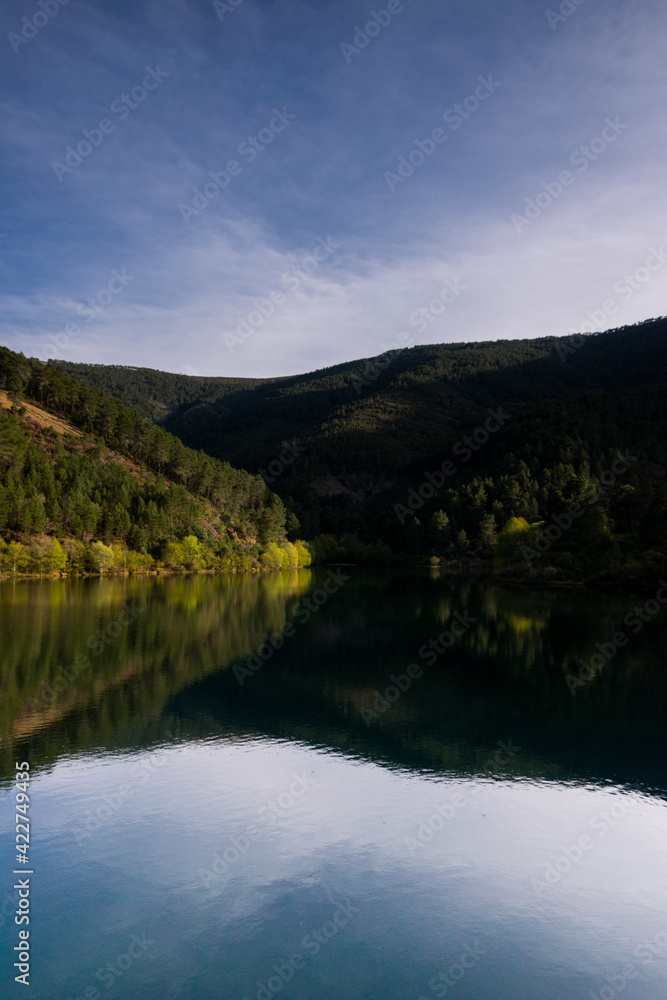 landscape of a water dam, forest and mountains in Las Hurdes.